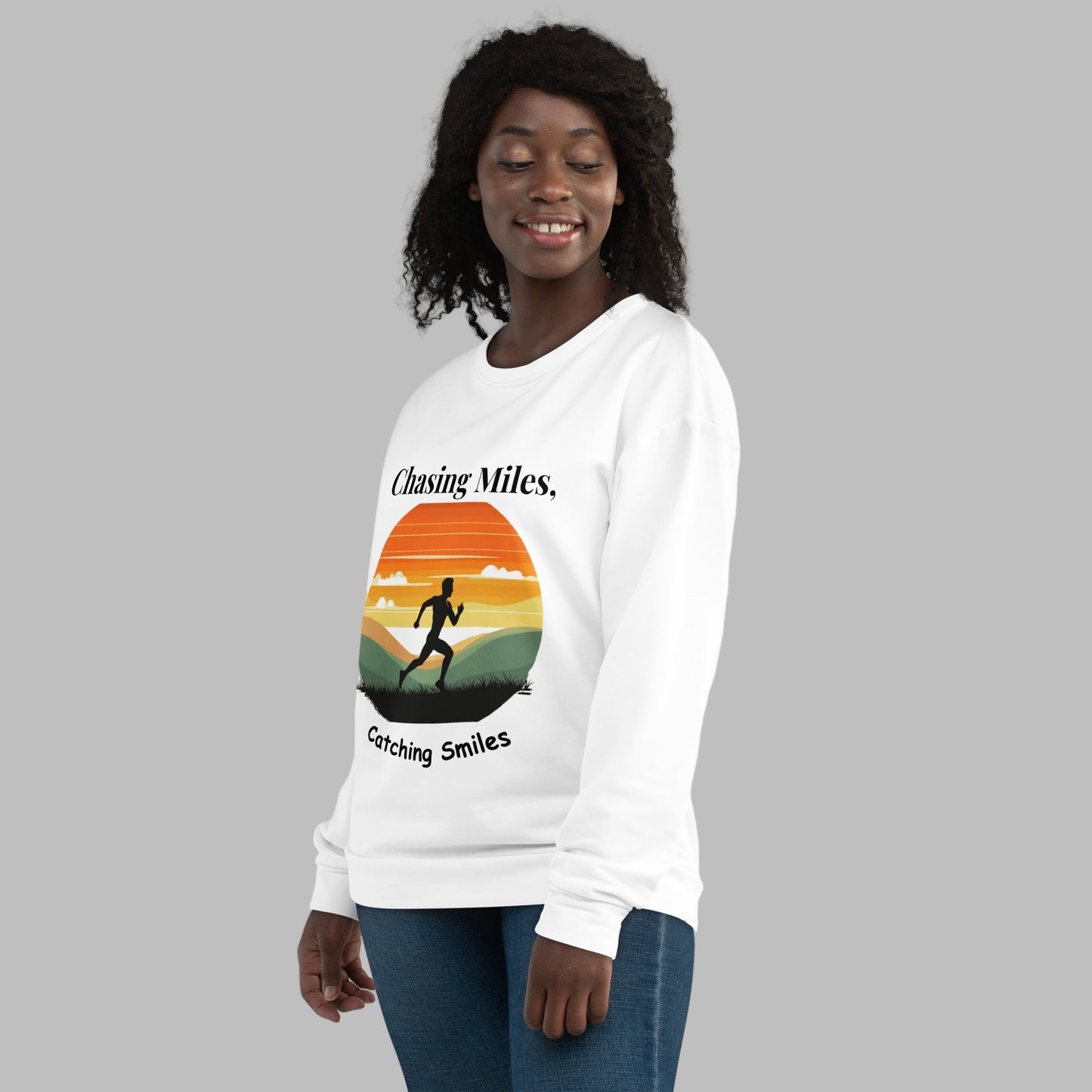 Person wearing a white sweatshirt with a graphic design and text on a white background