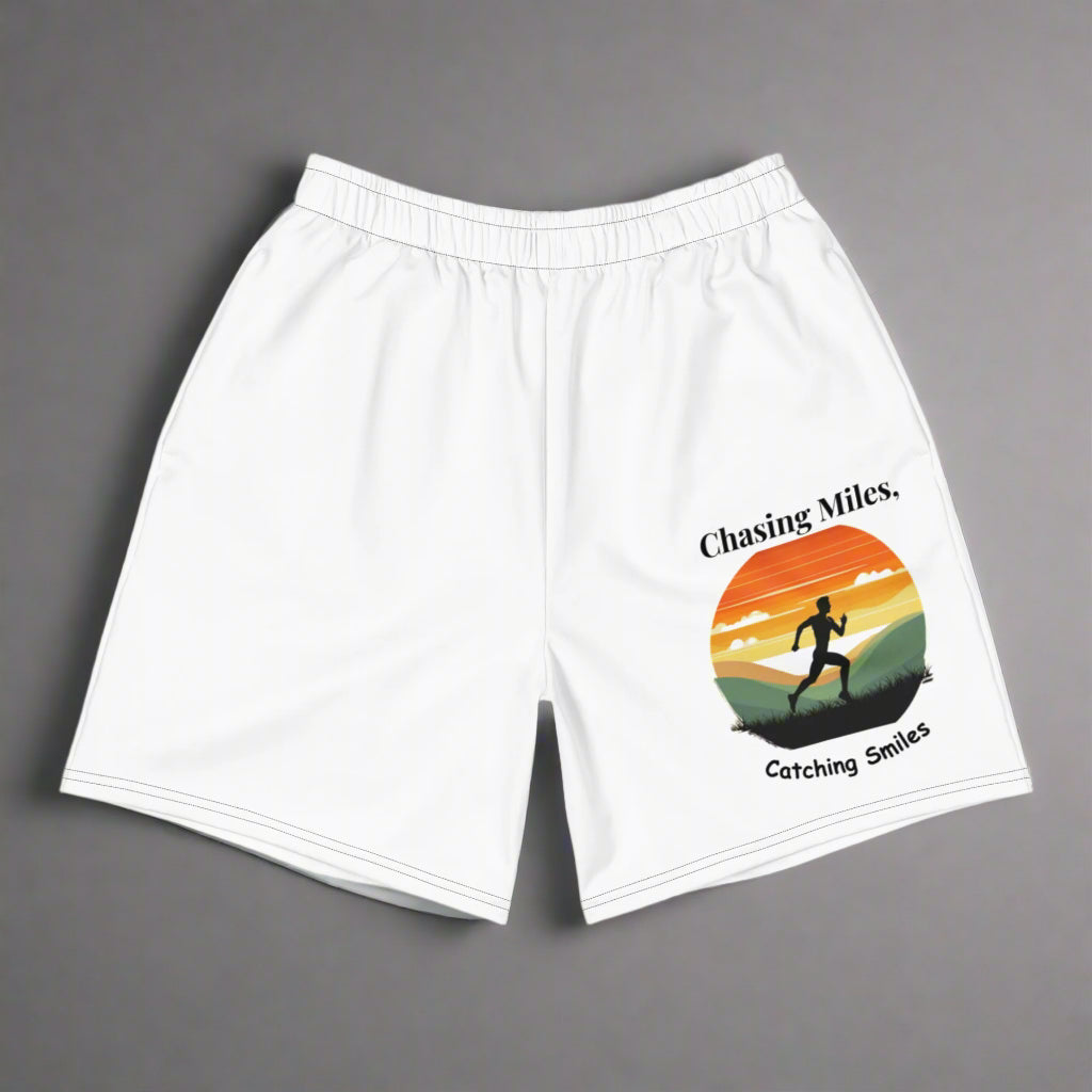 White shorts with a graphic design of a runner and sunset on a white background