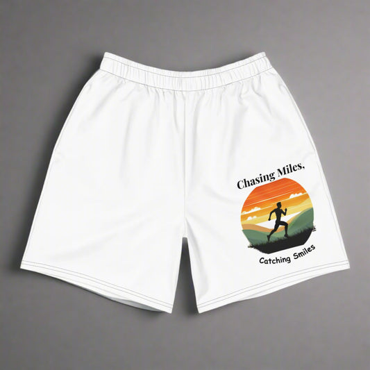 White shorts with a graphic design of a runner and sunset on a white background