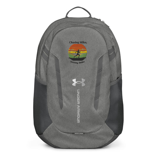 Gray Under Armour backpack with a graphic design on a white background