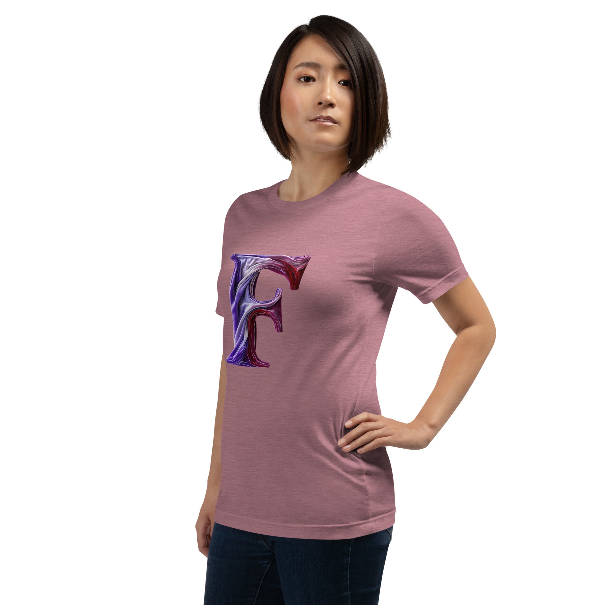 Person wearing a pink t-shirt with a colorful logo on a white background