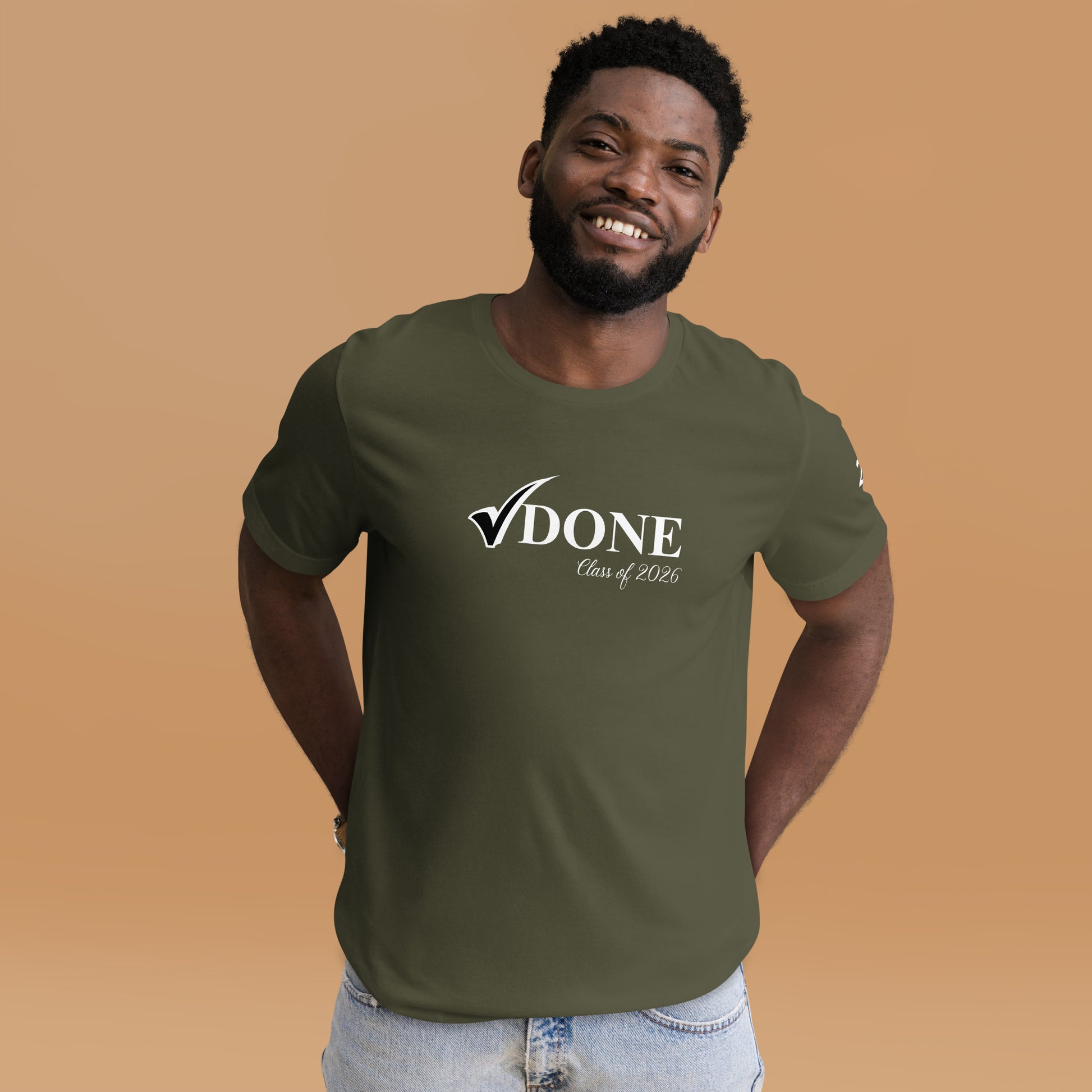 Man wearing a green t-shirt with 'DONE Class of 2026' text on a brown background