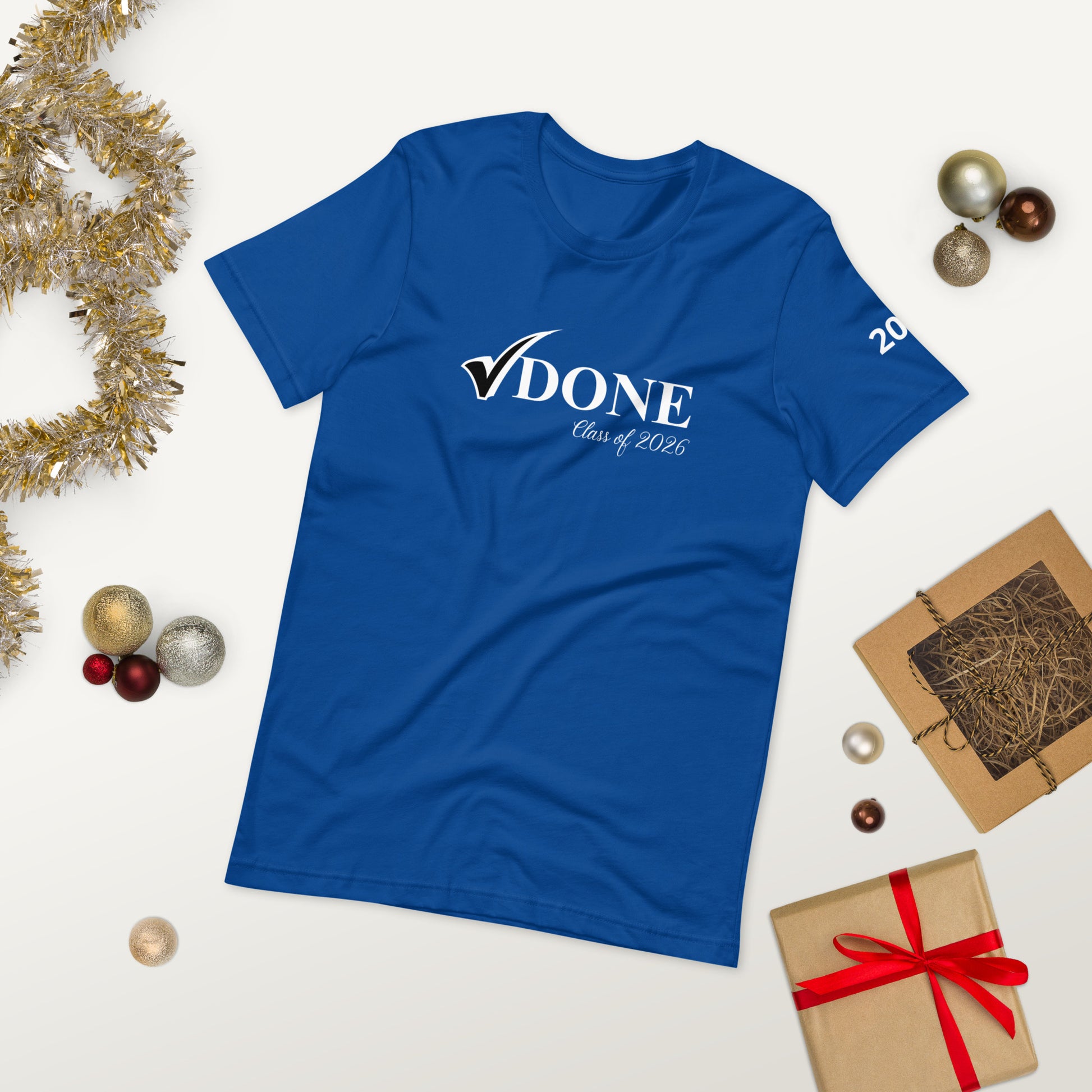 Blue t-shirt with 'DONE Class of 2025' text on a white background with Christmas decorations.