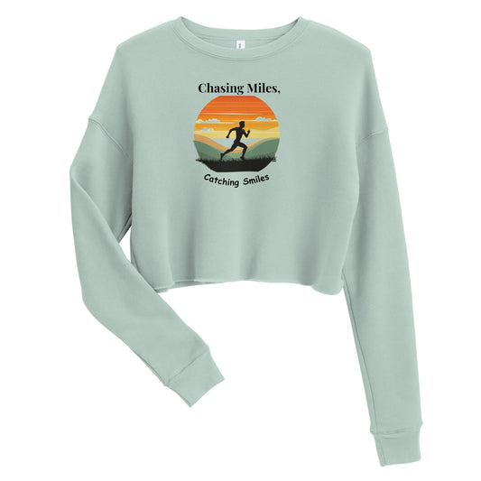 Light blue sweatshirt with a graphic design and text on a white background