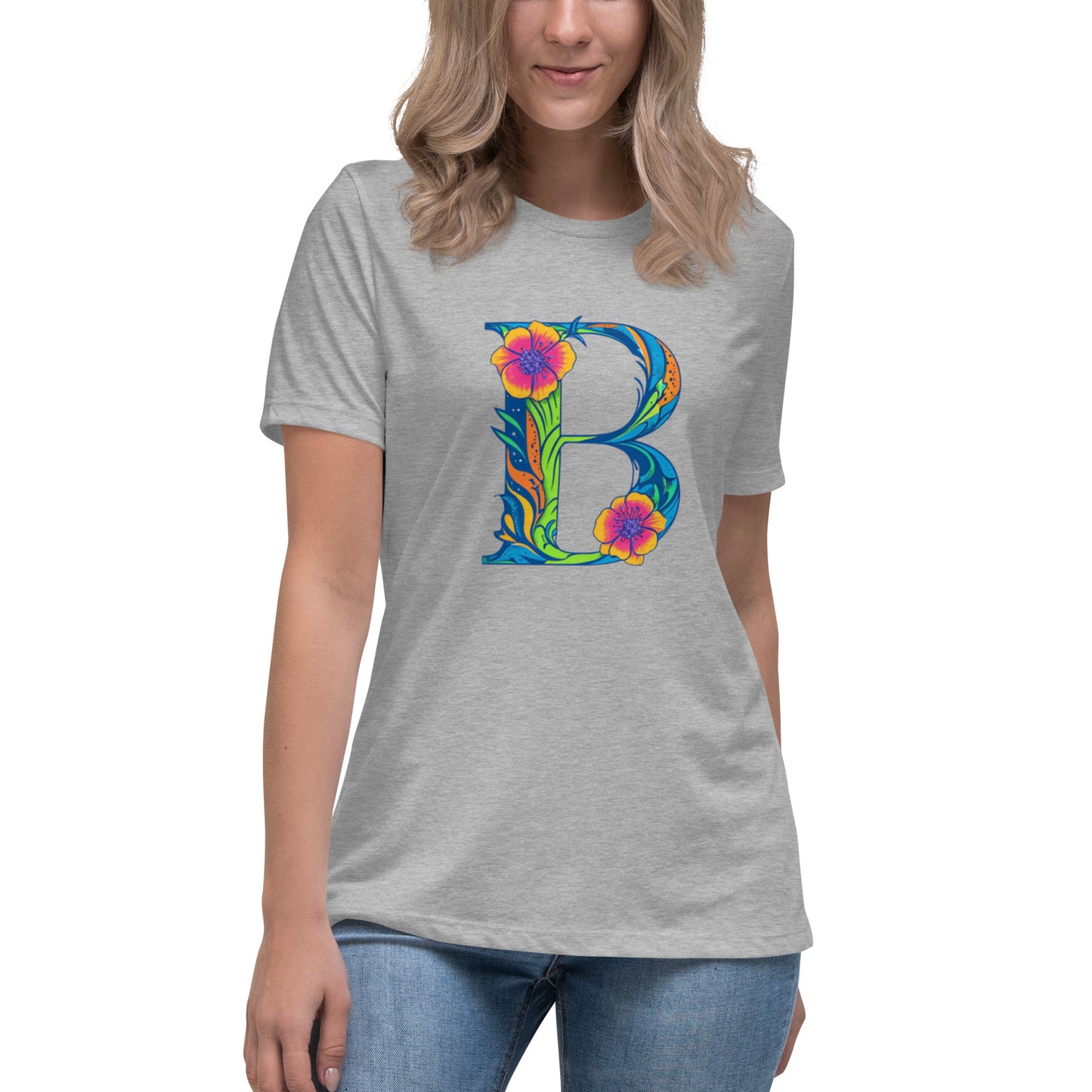 Person wearing a gray t-shirt with a colorful letter 'B' design on a white background