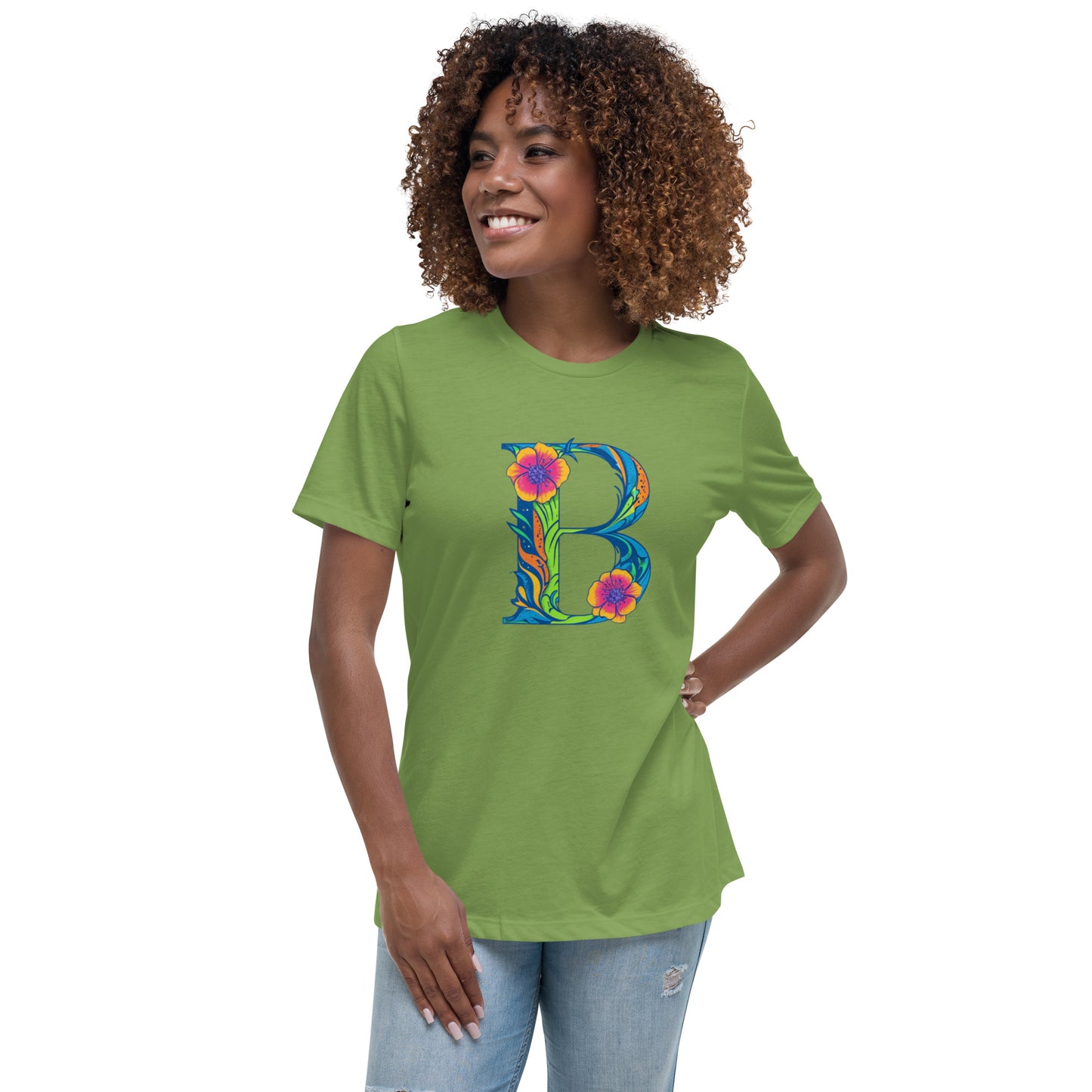 Woman wearing a green t-shirt with a colorful 'B' design on a white background