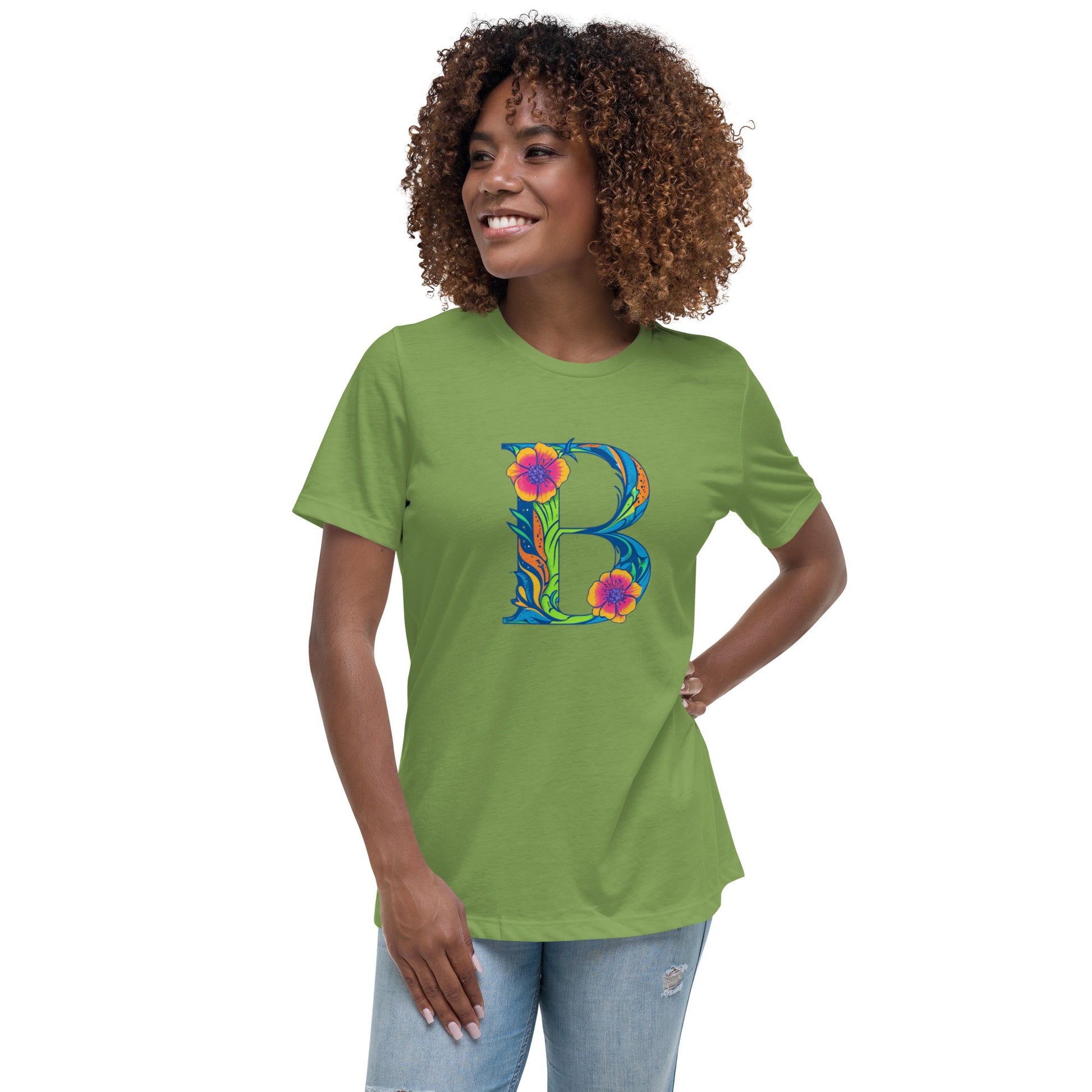 Woman wearing a green t-shirt with a colorful 'B' design on a white background